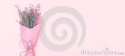 Lavender flower bouquet on pink. Minimal floral nature banner background in pastel colors Stock Photo