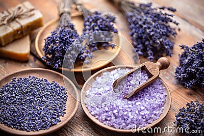 Lavender flowers and coloured bathing salt Stock Photo