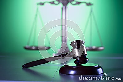 Law symbols, gavel, scale, books, Themis. Law concept background. Stock Photo