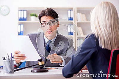 The lawyer discussing legal case with client Stock Photo