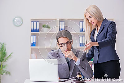 The lawyer discussing legal case with client Stock Photo