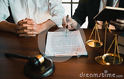 Lawyer explained to the client about the legal issues that must be taken in court in the office Stock Photo