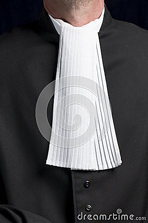 Lawyer in gown with jabot hands close up judge Stock Photo