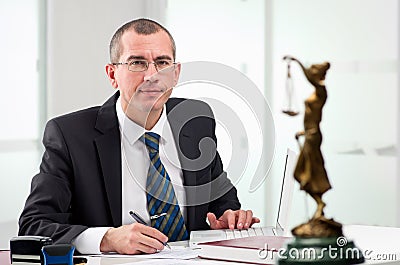 Lawyer on his workplace Stock Photo