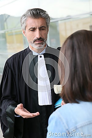 Lawyer meeting client outside the court Stock Photo