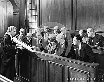Lawyer showing evidence to the jury Stock Photo