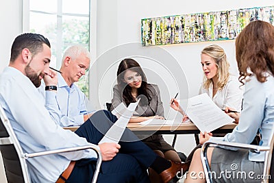 Lawyers having team meeting in law firm Stock Photo