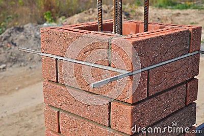 Lay bricks and blocks correctly. Closeup. Stock Photo