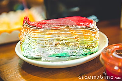 Layer cheesecake colourful rainbow sweet dessert Stock Photo