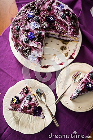 Layered cake with blueberries and lilac Stock Photo