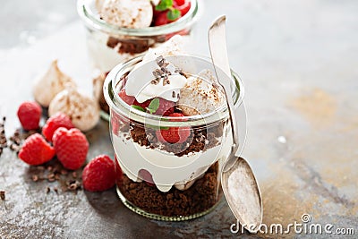 Layered dessert with chocolate cake and whipped cream Stock Photo