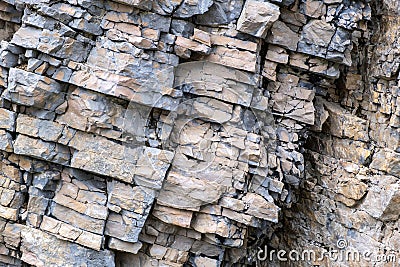 Layered empty rock, limestone, sandstone, slate formation background, texture. Copy space Stock Photo