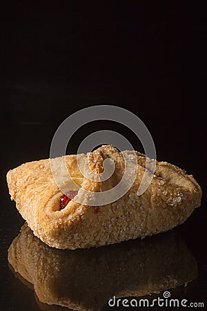 Puff pastry envelopes with jam Stock Photo