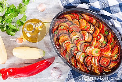 Layered ratatouille in a baking dish, top view Stock Photo