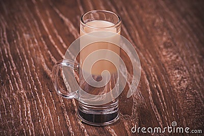 Layered shot cocktail with baileys Stock Photo