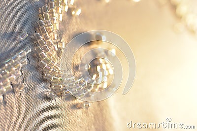 Layered triangular macro diamond shapes with a small diamond over them with bokeh background Description92/200 Backgrounds/ Stock Photo