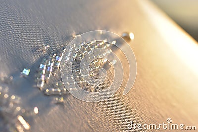 Layered triangular macro diamond shapes with a small diamond over them with bokeh background Description92/200 Backgrounds/ Stock Photo