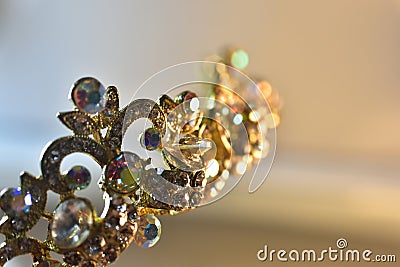 Layered triangular macro diamond shapes with a small diamond over them with bokeh background Description92/200 Backgrounds/ Stock Photo