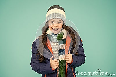 Layered up for wintry weather. Happy child with winter look. Little girl smile in casual winter style. Fashion winter Stock Photo