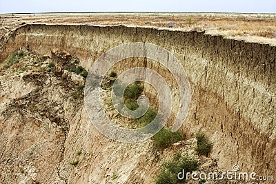 Layers of sedimentary rock formed on the earth`s surface. Outcrops on the southern coast of the Azov sea. Taman Peninsula, Temryuk Stock Photo