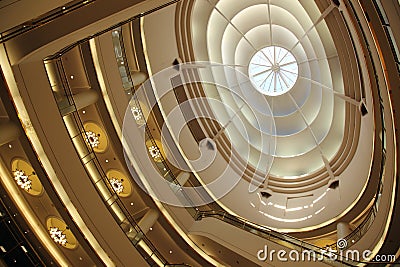 Layers of Shopping Mall Escalators Stock Photo