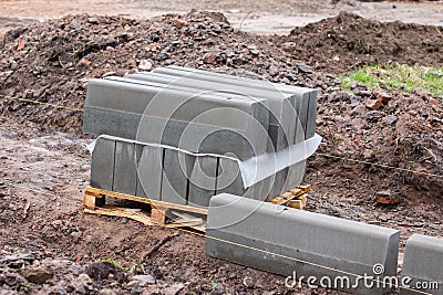 Laying of a curbstone. Stock Photo