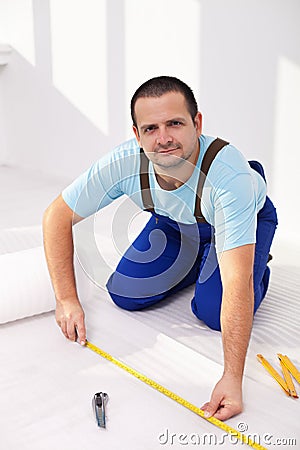Laying the flooring at home Stock Photo