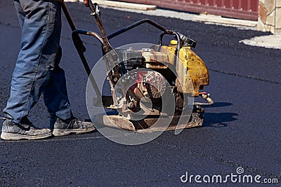 Laying fresh asphalt Stock Photo