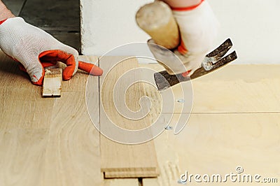 Laying hardwood parquet. Stock Photo