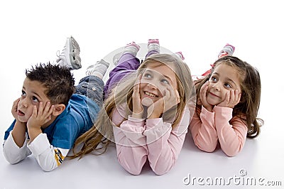 Laying kids looking upward Stock Photo