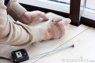 Laying laminate flooring Stock Photo