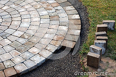 Laying patio bricks Stock Photo