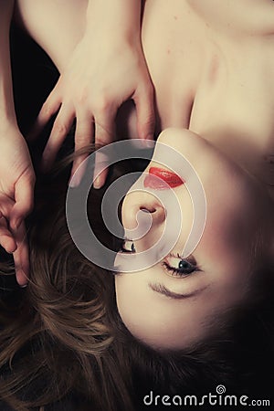 Laying young fair-haired woman Stock Photo