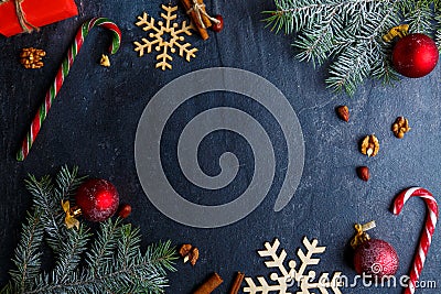 Layout on a background with a place for an inscription, decorated with a Christmas tree branch. Stock Photo