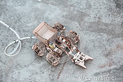 Layout, model of the controlled all-terrain vehicle, made and assembled by children from cardboard, homemade robotic toy Stock Photo