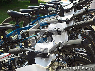 A row of bicycles with price tags on the street platform Editorial Stock Photo