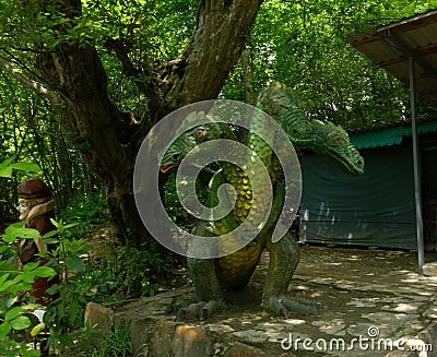 LAZAREVSKOE, SOCHI, RUSSIA - MAY, 29, 2021: Wooden figurine of gornych snake Zmey Gorynych in the recreation area of Editorial Stock Photo