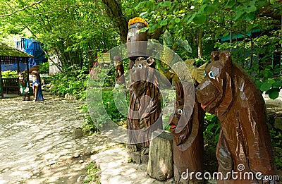 LAZAREVSKOE, SOCHI, RUSSIA - MAY, 29, 2021: Wooden figurine of three bears in the recreation area of Berendeyevo Kingdom Editorial Stock Photo