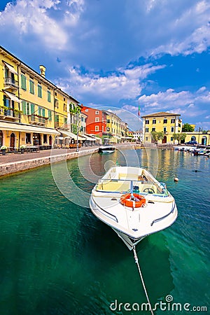 Lazise colorful harbor and boats view Stock Photo