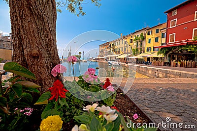 Lazise colorful harbor and boats view Stock Photo