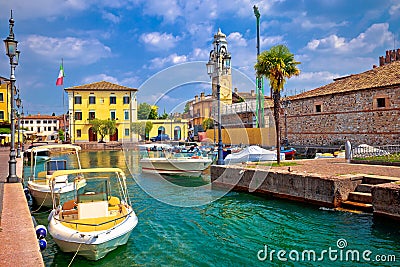 Lazise colorful harbor and boats view Stock Photo