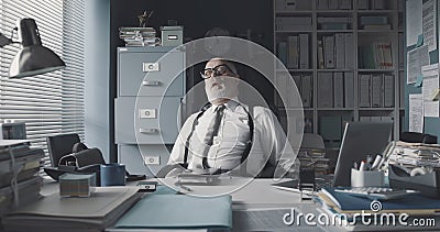 Lazy exhausted businessman napping in the office Stock Photo