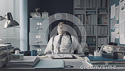 Lazy exhausted businessman napping in the office Stock Photo