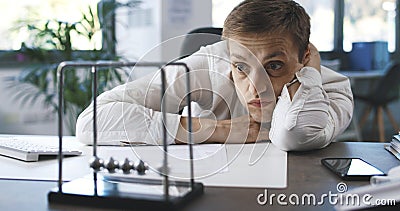 Lazy inefficient businessman in the office Stock Photo