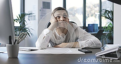 Lazy inefficient businessman in the office Stock Photo