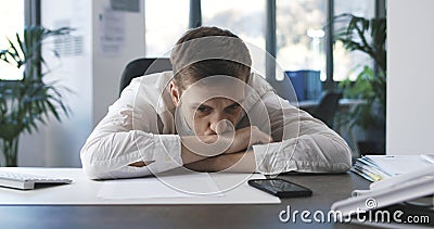 Lazy inefficient businessman in the office Stock Photo