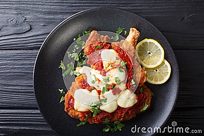 Laï¿½milanesa napolitana - homemade veal cutlet with mozzarella ch Stock Photo