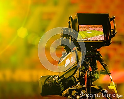 LCD display screen on a High Definition TV camera with bright sun and lens flares. Toned Stock Photo