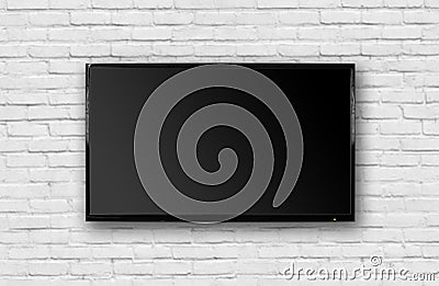 LCD TV with a thin black frame hanging on a white brick wall. Blank black screen. Isolated on white background Stock Photo