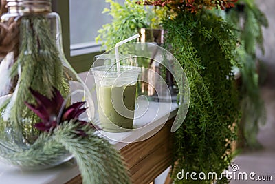 lce Macha milk green tea in greenery coffee cafe Stock Photo